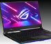 Angled render of an ASUS ROG Strix Scar gaming laptop on a black and gray gradient background.